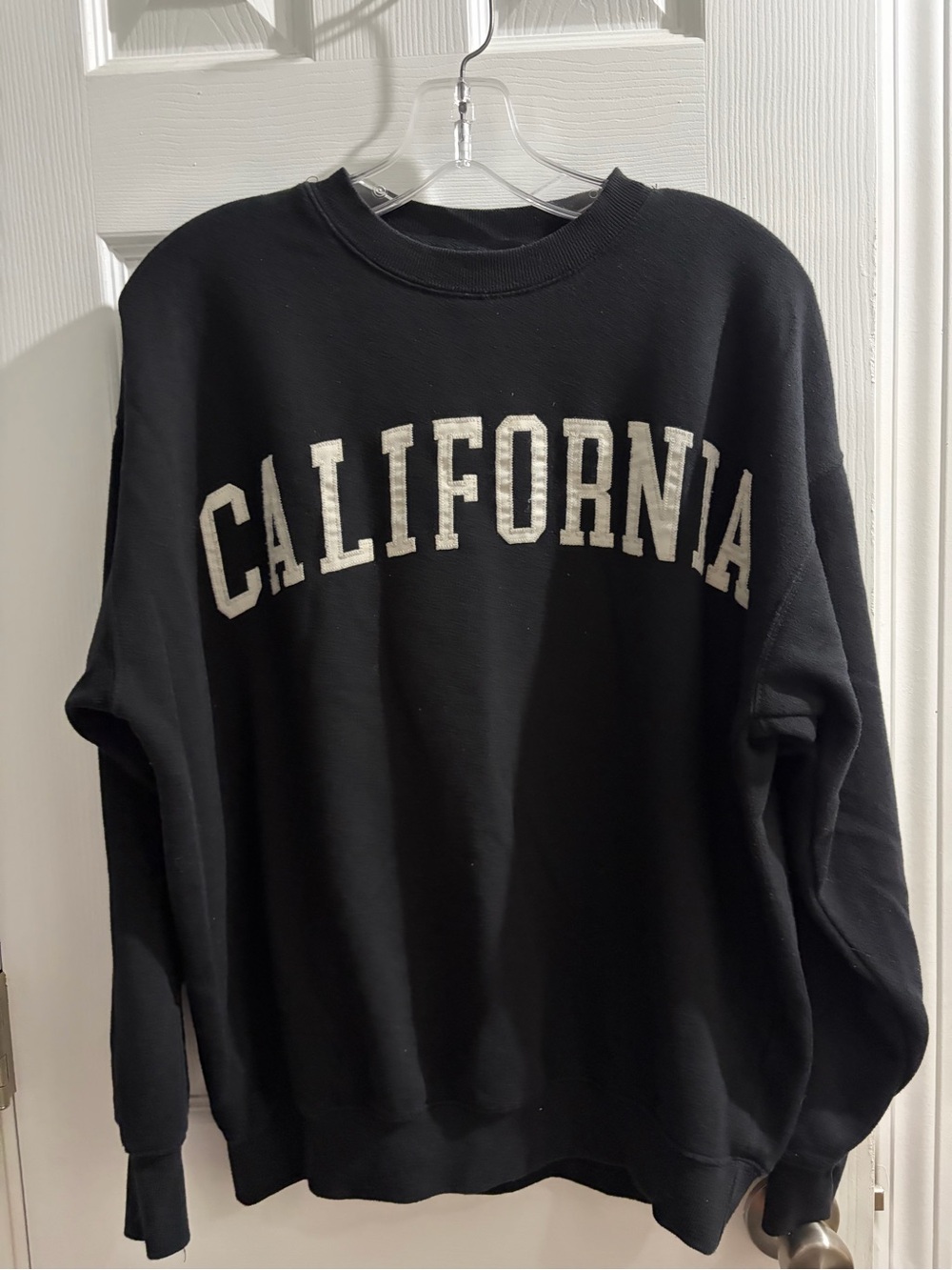 Reflex Black Sweatshirt with White "CALIFORNIA" Lettering